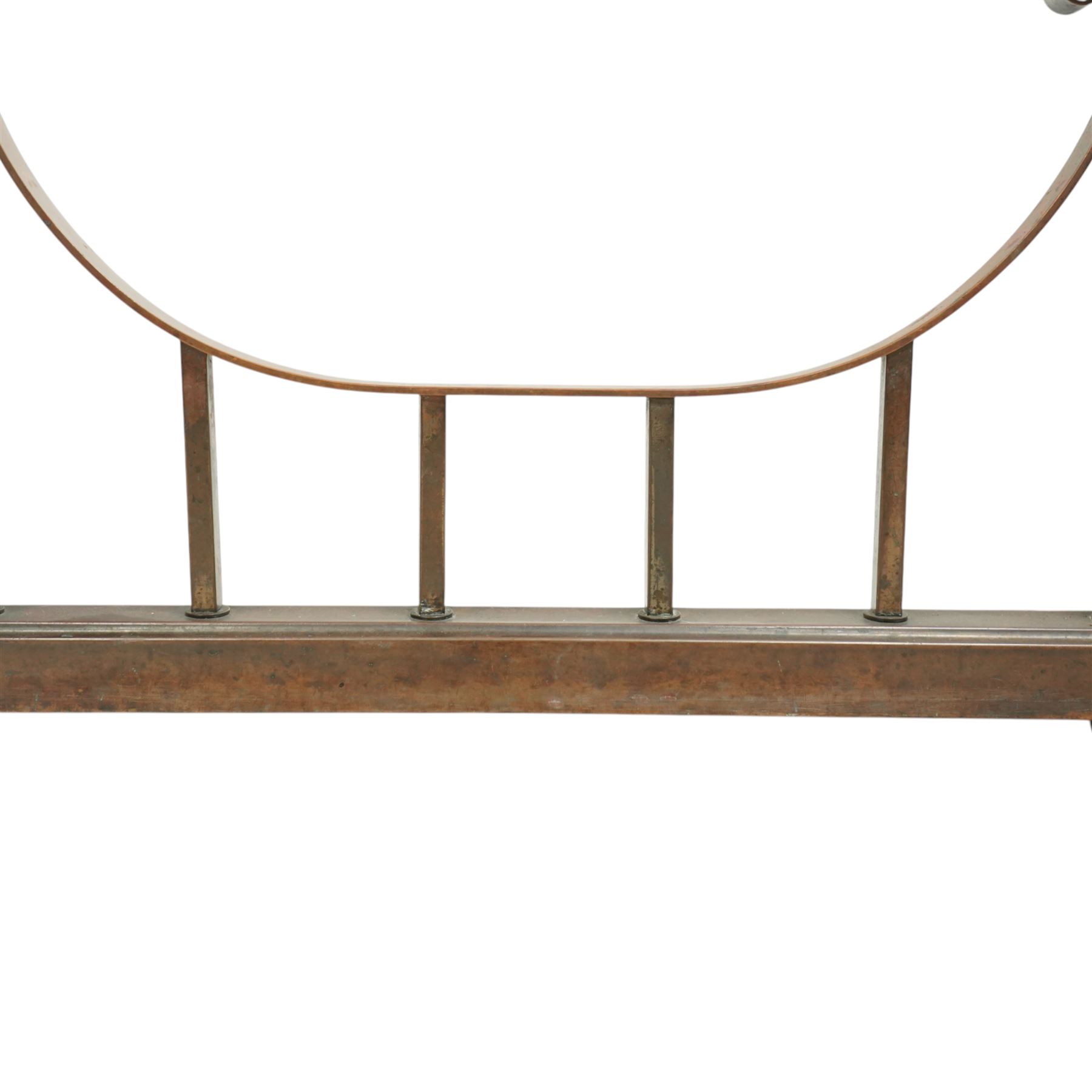 Early 20th century brass and buttoned green leather club fender with plain uprights 