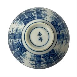 Chinese blue and white tea bowl decorated with birds and leaves, two character mark to base