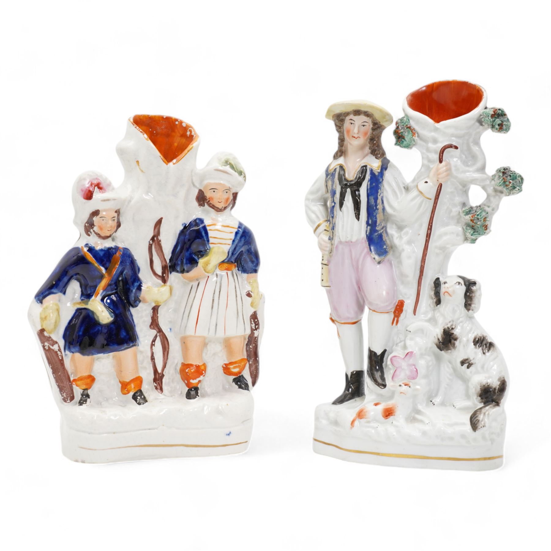 Victorian and later Staffordshire flatbacks, spill vases and figures including 'Gipsy Boy', two modelled as 'Marquess of Lorne and Princess Louise', 'Uncle Tom & Eva', 'Paul & Virginia' and other models, H33cm max (12)