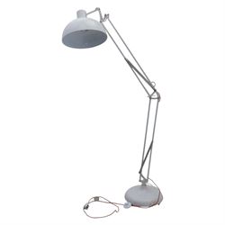 Contemporary white floor lamp, in the manner of Anglepoise, counter balance sprung arm, red cord with a weighted base 