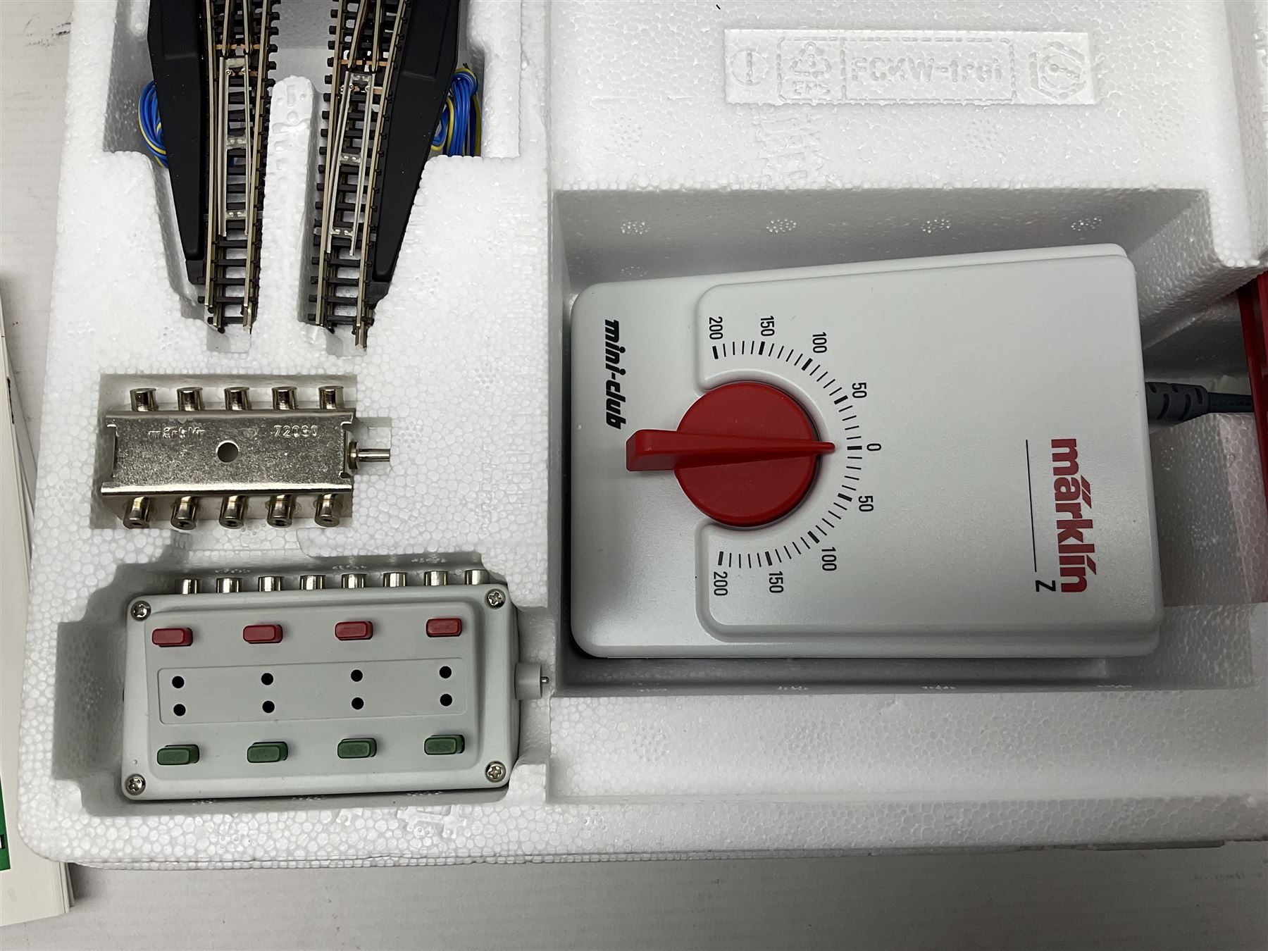 Marklin 'Z' gauge - No.81852 train set with double pantograph locomotive and four goods wagons; boxed