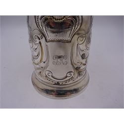 George III silver tankard, of slightly tapering cylindrical from, with chased and repousse crown above a monogrammed cartouche and floral, foliate and C scroll decoration, with acanthus capped C scroll handle, hallmarked WT, possibly William Turton, London 1774, H11.5cm