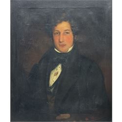 English School (Early 19th century): Half Length Portrait of a Regency Period Gentleman, oil on canvas unsigned, housed in moulded gilt frame with cartouche corners 75cm x 62cm 