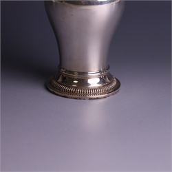 Mid 20th century silver sugar shaker, of typical baluster form, the removable pierced cover with urn finial, hallmarked William Comyns & Sons Ltd, London 1961