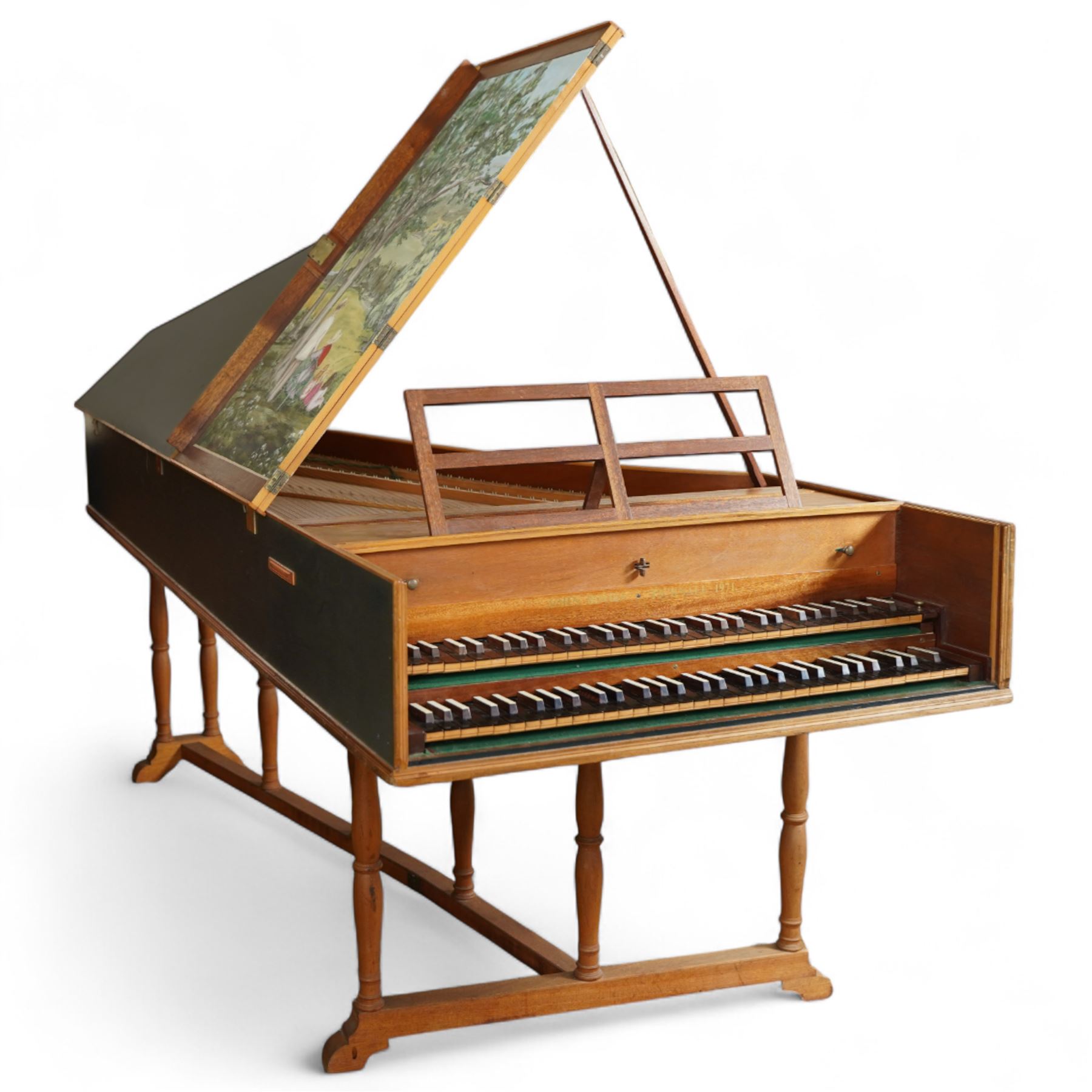 20th century “French style” Two manual Harpsichord by John Rooks of Tincknall (1971).
Double manual keyboards with three sets of strings: Two Unison, one octave and “buff” stop. Black outer casing with gold banding, five octave keyboards with 63 keys E1-G6, with black naturals and synthetic covered white sharps, inner lid painted with a rural scene, with adjustable music desk. Soundboard, bridges, strings and synthetic jacks in good condition with just one small crack to the treble area of the soundboard, key action with reasonable repetition and damping but in need of some regulation, case raised on turned baluster supports.

 You can find and listen to an example of Alan Cuckston playing this particular Harpsichord in the link below:
The King’s Hunt by John Bull

Given the intricate nature of these historic instruments, specialist support will be available if required, to assist successful buyers with safe removal and onward handling. Price upon application. 

