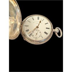 Late Victorian silver full hunter pocket watch by Tho Russell & Son no. 82844, with white enamel dial and subsidiary seconds dial, the front cover with blank cartouche, hallmarked Chester 1891