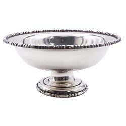 Edwardian silver pedestal bowl, the circular bowl with bead and dart rim upon a spreading circular foot with conforming rim, hallmarked London 1904, makers mark worn and indistinct, H6cm D13.5cm, approximate weight 5.29 ozt (164.6 grams)
