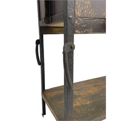Cottam & Company, Winsley St. London - 19th century oak and metal framed tack and saddling trolley-stand, raised and collapsible frame fitted with wrought metal hooks, pointed and slated top over panelled sides, fall front cupboard to each side, on wrought metal frame with under tier, fitted with hinged handles and wheels, the frame inscribed 'Cottam & Company, Winsley St. London'
