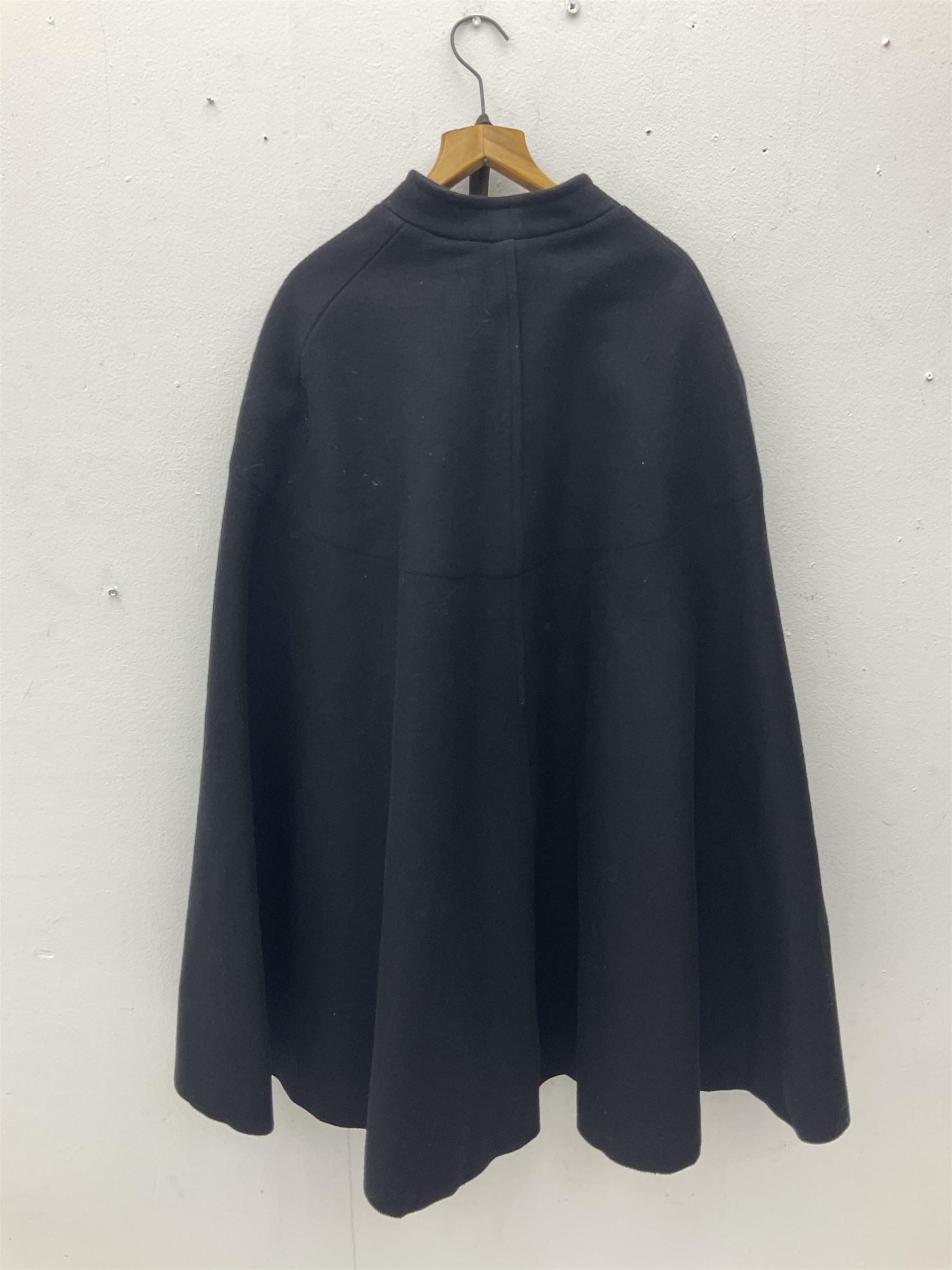 Police Constabulary style uniform items comprising woollen night cape / cloak with chain fastening, helmet and truncheon