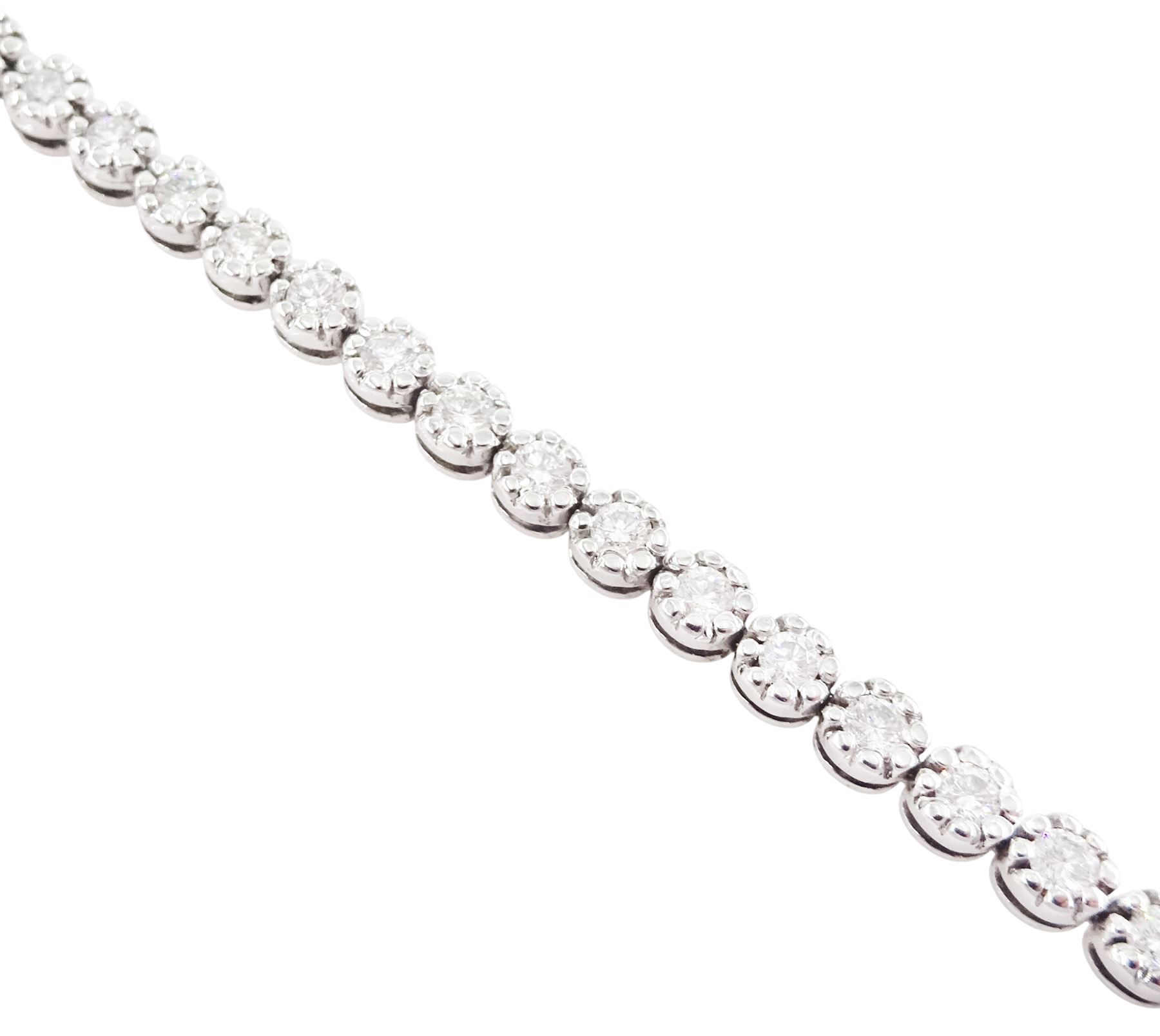 18ct white gold diamond bracelet, forty-eight round brilliant cut diamonds, in a bead setting, stamped 750, total diamond weight approx 2.50 carat