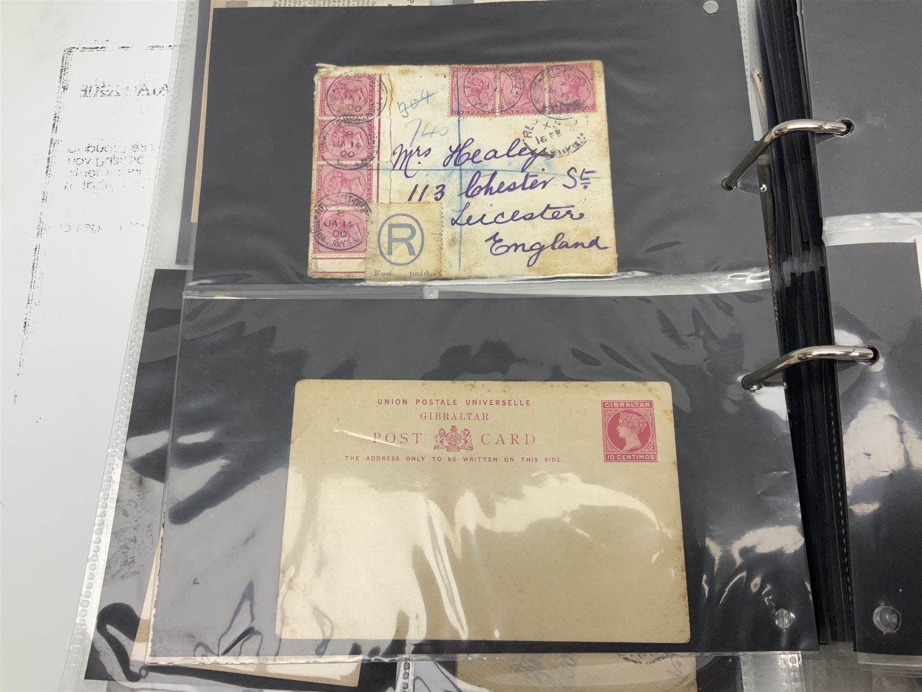 Queen Victoria and later Great British and World postal history, including postal stationary, mourning covers, QV Natal one penny stamps on cover, registered letters, postmark interest etc, housed in a ring binder folder