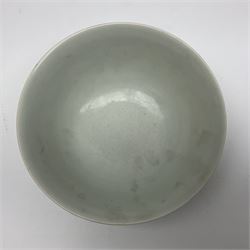 Pair of Chinese famille jaune bowls, decorated in green enamel with a dragon chasing a flaming pearl amongst clouds, upon a yellow ground, the interior decorated to centre with dragon, with six character mark beneath, D17.5cm