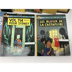 Twenty one first edition Herge, 'The Adventures of Tin Tin' books published by Casterman Bruxelles, with French text and coloured comic strip illustrations throughout; comprising Tintin Au Congo 1946, Tintin En Amerique 1946, Les Cigares du Pharaon 1955, Le Lotus Bleu 1946, L'Oreille Cassee 1943, L'ile Noire 1943, Le Sceptre d O'ttokar 1947, Le Crabe Aux Pinces D'or 1943, L'Etoile Mysterieuse 1942, Le Secret de la Licorne 1943, Le Tresors de Rackan Le Rouge 1945, Les 7 Boules de Cristal 1948, Le Temple du Soleil 1949, Au Pays de L'Or Noir 1950, Objectif Lune 1953, On a Marche sur la Lune 1954, L'Affaire Tournesol 1956, Coke en Stock 1958, Tintin au Tibet 1960, Les Bijous de la Castafiore 1963 and Vol 714 Pour Sydney 1968
