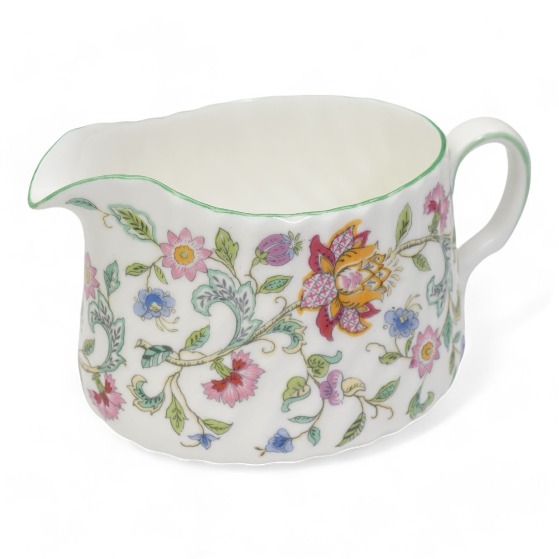 Minton Haddon Hall tea and dinner wares, including six cups and saucers, milk jug, six side plates (two different sizes), one sandwich plate, a large bowl and nine salad bowls 