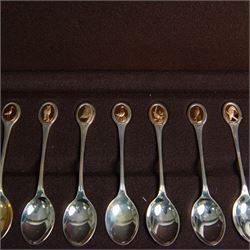 Royal Society for The Protection of Birds silver spoon collection, twelve spoons each inset with a silver-gilt bird cameo, hallmarked John Pinches Ltd, London 1975, in wooden presentation case with certificate of authenticity