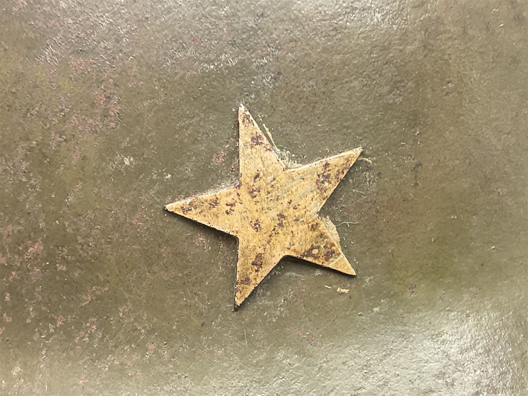 WW2 Japanese Army type 92 steel helmet with infantry star badge to centre, webbing liner and chin strap