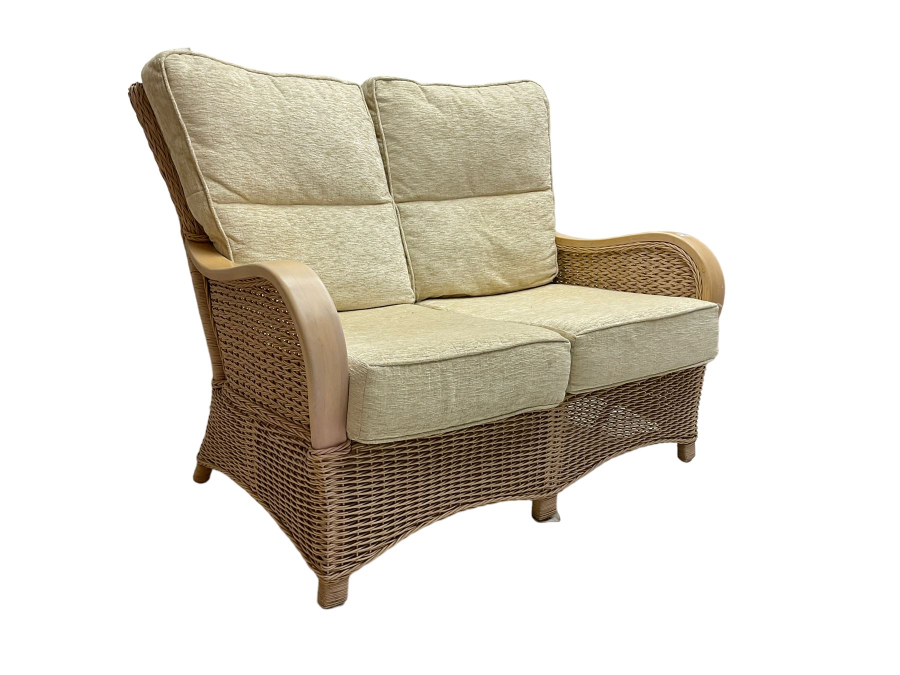 Contemporary rattan conservatory suite - two seat sofa with wicker frame and loose cushions upholstered in textured champagne fabric (W125cm H98cm); pair of matching armchairs (W72cm H98cm); rectangular glass-topped coffee table with rattan frame and undertier (W85cm D60cm H47cm); and matching square side table (W53cm H55cm)