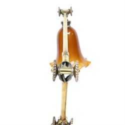 John Dugdill, early 20th century brass angle poise desk lamp, circa 1930's, with daisyhead joints and amber coloured lampshade, upon a circular wooden base 