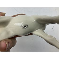 Seven Beswick figures of horses, including Connemara pony in grey no.1641, Arab in bay no.1265, large foal in grey no.947 etc, together with a Goebel figure of a horse (8)