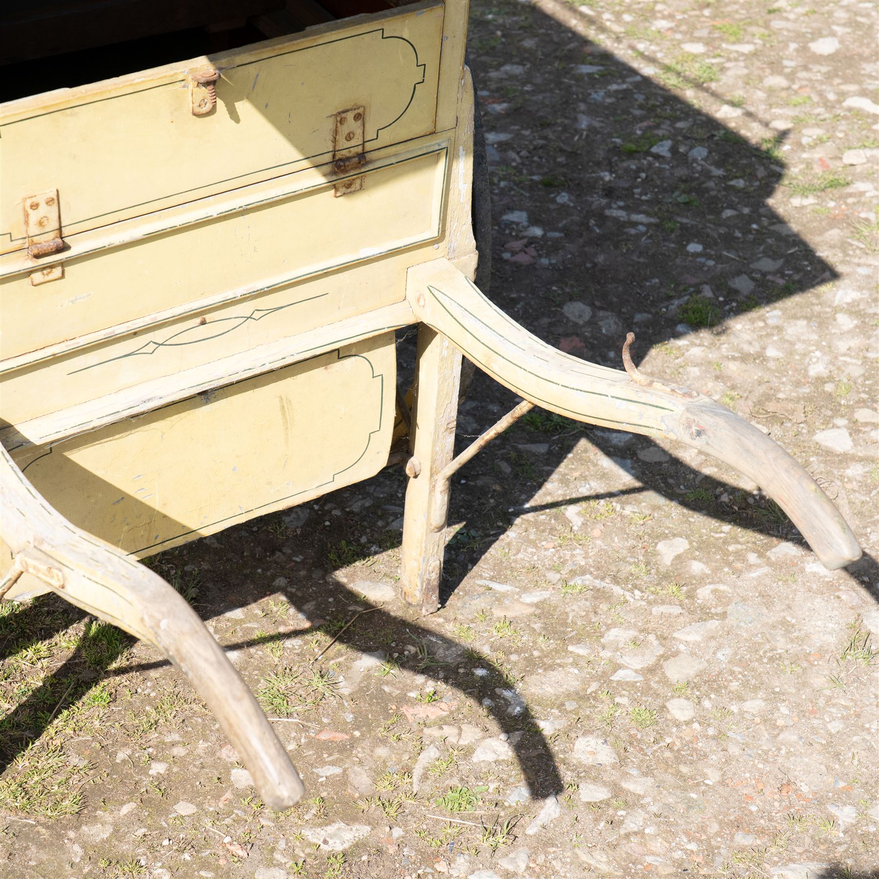 James I. Douglas, Baker & Confectioner, Laurencekirk Hand Drawn Delivery Cart

An attractive late 19th or early 20th century hand drawn baker's delivery cart, finished in cream and retaining its original hand painted advertising livery for James I. Douglas, Baker & Confectioner, Laurencekirk. The enclosed body features a curved roof with external luggage rail, rear access doors and internal shelving for the transport and delivery of bread, cakes and confectionery. Mounted on large wooden spoked wheels with iron tyres and fitted with shaped shafts for a single horse, this is a highly decorative and increasingly scarce example of a provincial tradesman's delivery vehicle, offering excellent display potential for collectors, museums, period interiors or commercial settings.

Features:
• Original hand painted signwriting for James I. Douglas, Baker & Confectioner, Laurencekirk
• Enclosed delivery body with curved roof and external luggage rail
• Rear opening access doors with internal storage compartments
• Original internal wooden shelving and racks
• Large wooden spoked wheels with iron tyres
• Shaped shafts for single horse traction
• Builder's mark for Geo. Roberson Ltd., Wallington
• Decorative cream painted finish with period lining and detailing
• Suitable as a display piece, museum exhibit or advertising feature

Dimensions:
Overall length: 170 cm
Body length: 104 cm
Width: 83 cm
Height: 150 cm

Wheel Diameter:
Wheels: 95 cm