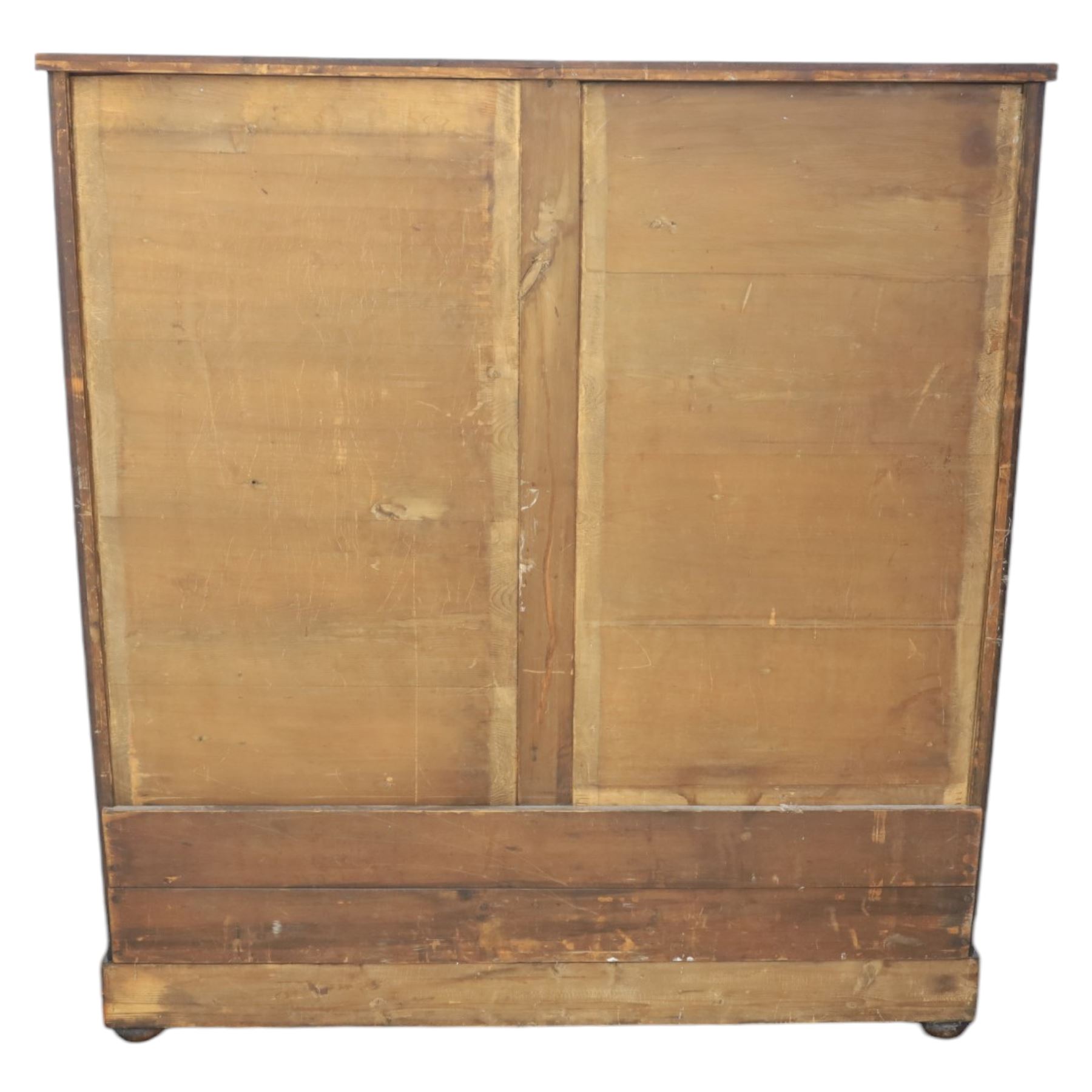 Victorian Scottish mahogany chest, cushion drawer over assorted small drawers and three long drawers, all with flame veneered fronts, turned wooden handles