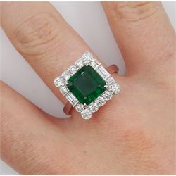 18ct white gold milgrain set emerald, round brilliant and baguette cut diamond cluster ring, stamped 750, emerald 2.98 carat, total diamond weight 1.03 carat, with World Gemological Institute Report