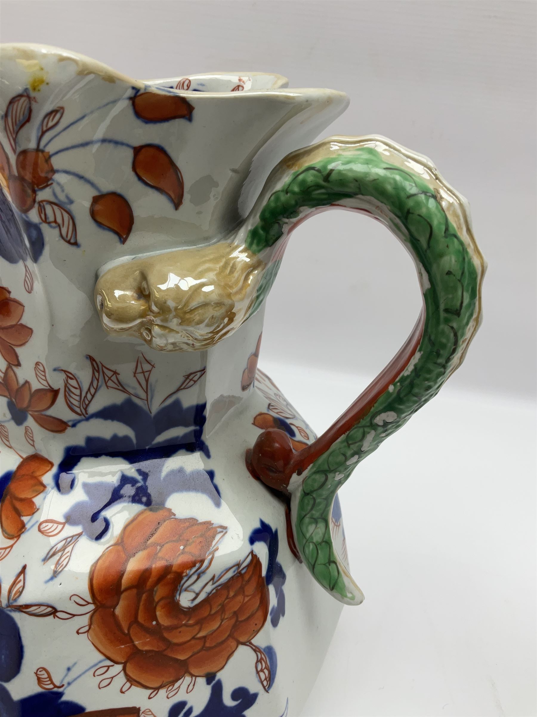 Two Masons Ironstone jugs, each in the Imari palette with serpent handles, with maker's mark beneath, tallest H24cm