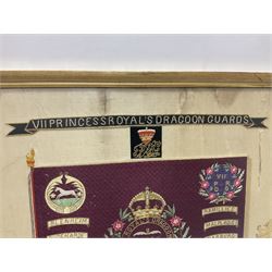 Commemorative Military needlework, headed 'VII Princess Royal's Dragoons Guard, the central flag has the regimental title, surrounded by a Union wreath of roses, thistles and shamrocks, topped with a crown, the Hanoverian white horse features in two corners, framed H58cm, L73cm