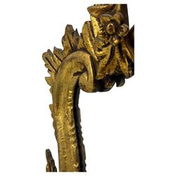 18th century design gilt framed wall mirror, within a pierced and scrolling foliate frame, leaf sprays and flowerhead cresting