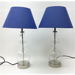 Pair of double gourd shaped clear glass table lamps with blue shades H55cm. 