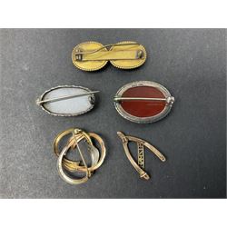 9ct gold jewellery including leaf brooch, wishbone Mizpah brooch, carnelian brooch, gold cased ladies Omega wristwatch, on leather strap and gold cased ladies Tissot wristwatch on expanding gilt strap, together with silver brooches and a Czech paste buckle, etc