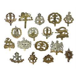 Seventeen regimental cap badges including Dorsetshire, Worcestershire, Staffordshire, Lancashire, Manchester, Middlesex, Berkshire, Bedfordshire etc (17)
