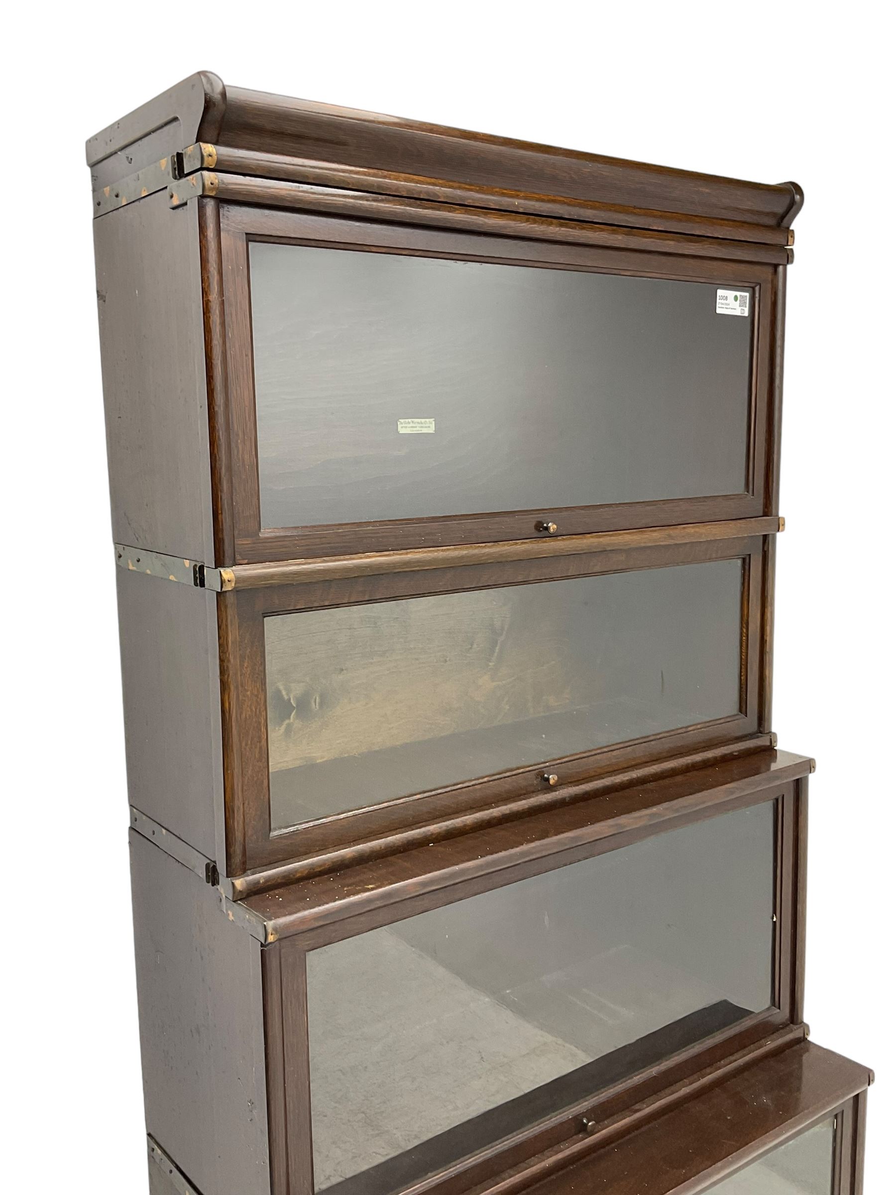 Globe Wernicke early 20th century waterfall stacking library bookcase, four tiers with hinged