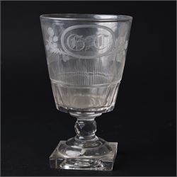 Early 19th century glass rummer, the deep bucket shaped bowl engraved with an oval roundel...