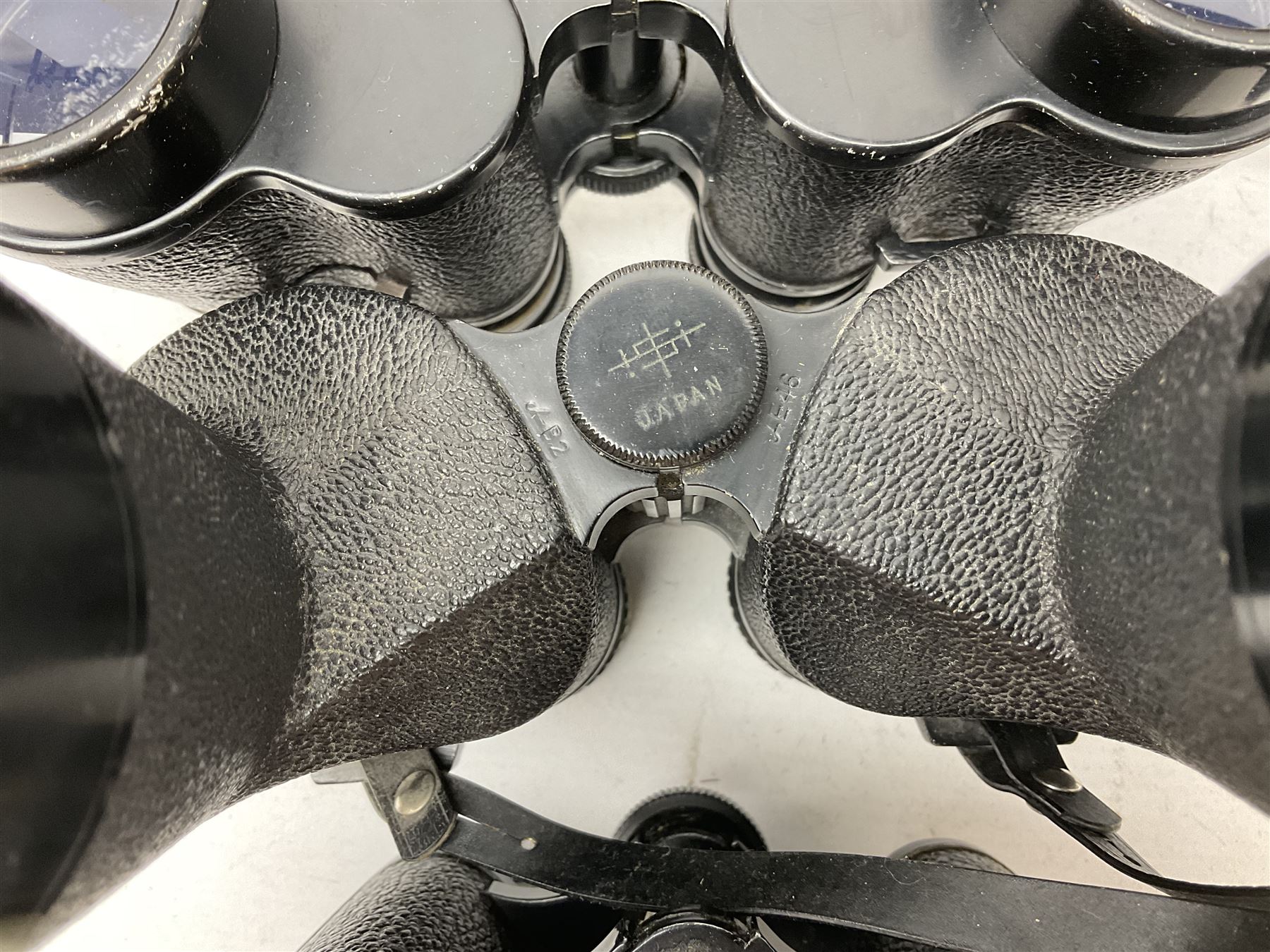 Twelve pairs of binoculars to include BWCF 7x35 Extra Wide Angle, Carl Zeiss Jena Delturis 8x24, Carl Zeiss Jena Jenoptem 8x30W, Chinon Countryman 10x50,  Ajax 8x30, Regent 16x50, etc,  some with cases