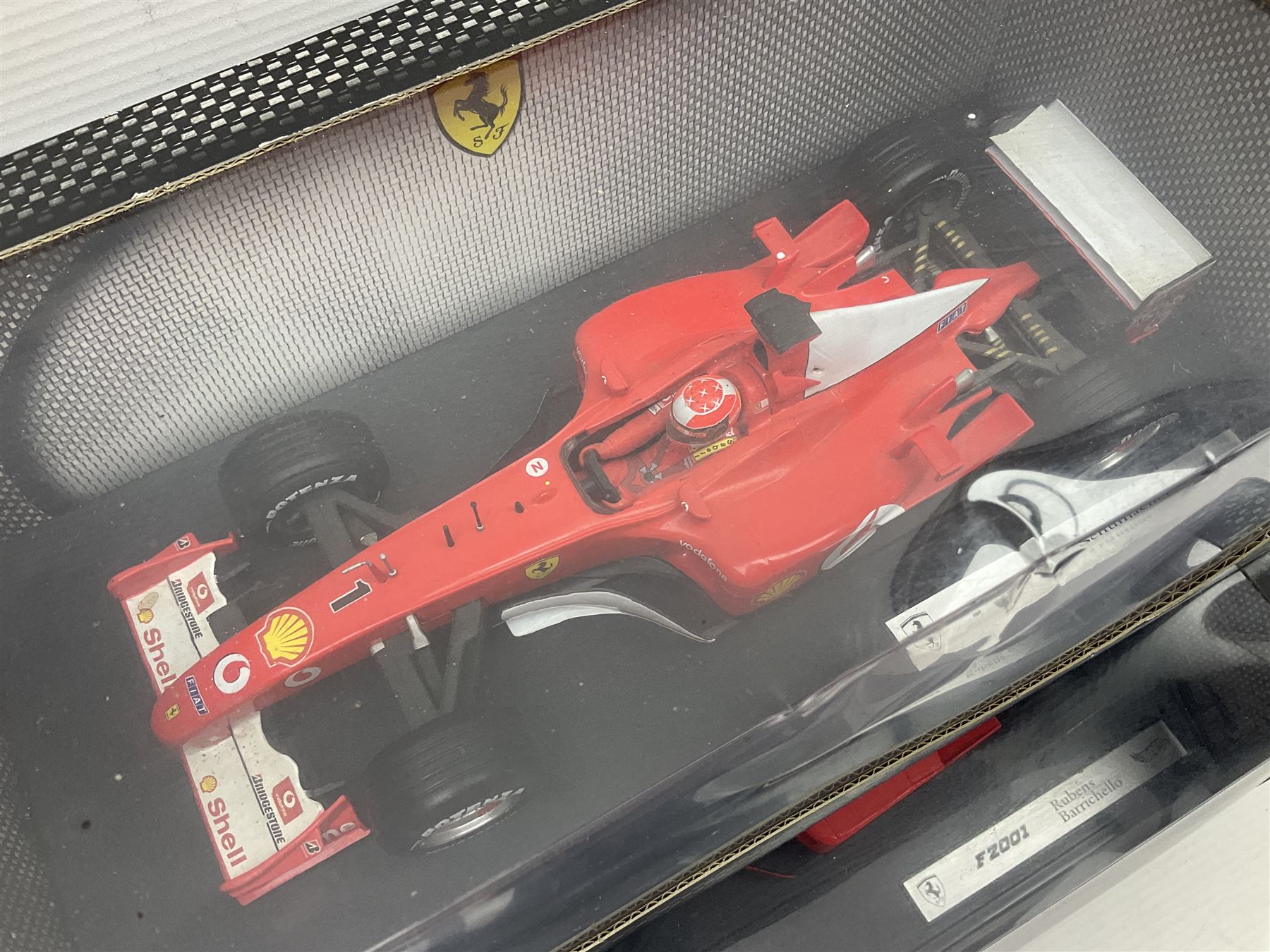 Five Mattel Hot Wheels 1:18 scale die-cast racing cars - Ferrari F1-2000 Michael Schumacher; Ferrari F-2002 Michael Schumacher; Jordan E-110 Heinz-Harald Frentzen; Williams F1 Team FW23Juan Pablo Montoya; and Ferrari F2001 Rubens Barrichello; all boxed (5)