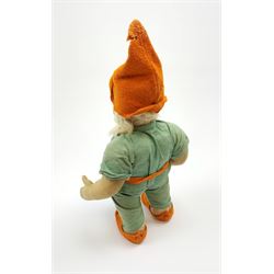 Chad Valley pressed felt figure of the Disney Snow White dwarf 'Doc' with painted facial features, standing wearing a green linen suit with orange hat, belt, buttons and shoes H13