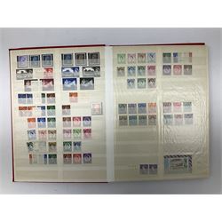 Great British and World stamps including Cape of Good Hope, Natal, British South Africa, Jersey, Southern Rhodesia, Northern Rhodesia, Zambia, Great British Queen Victoria penny reds etc and various first day covers, housed in three stockbooks and loose