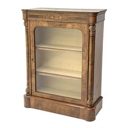 Victorian walnut pier display cabinet, figured book matched veneered top over frieze inlaid with trailing foliage, glazed door enclosed two shelves, gilt metal beading and floral mounts, on plinth base