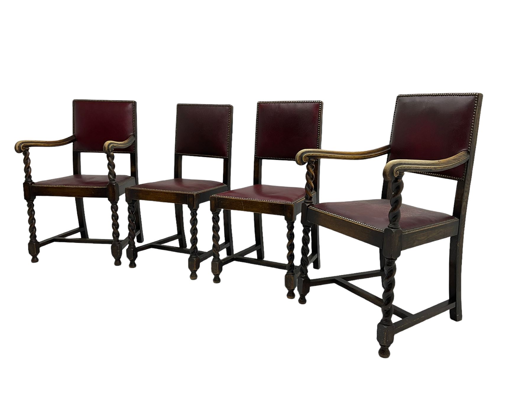 Set four early 20th century oak barley twist dining chairs, upholstered in burgundy leather with stud work, two carvers and two side chairs