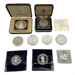 Nine coins including Commonwealth of the Bahamas 1978 ten dollars, Queen Elizabeth II St. Helena 1973 silver twenty-five pence, Canada 1994 one ounce fine silver five dollars, United States of America 1994 one ounce fine silver dollar etc