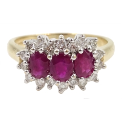  9ct gold ruby and diamond cluster ring, three oval rubies with diamond surround  