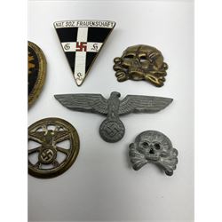 Six WW2 German badges - cap badge D.A.F. labour front; SS skull cap insignia First pattern 1925-35; Frauenschen Mother's Union; tank driver collar badge 1939-42; N.S.K.K. cycle corps; and officer's cap insignia 1940-42 (6)