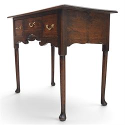 18th century oak lowboy, rectangular plank top with moulded edge, above three assorted drawers with brass swan neck handles, shaped apron raised on pad feet