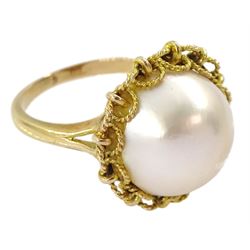 Gold single stone mabe pearl ring, stamped 9ct