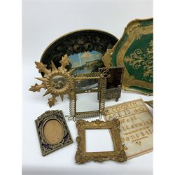 A group of assorted collectables, comprising a small 19th century mahogany swing toilet mirror, H34cm, small Vintage sunburst mirror, various picture frames, small Moravian star glass shade, Vintage toleware tray marked beneath made in Italy, tin tea tray detailed Chatsworth, small cross stitch sampler detailed West Butterwick Doncaster. 