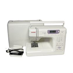 Janome sewing machine in case 