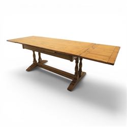 Traditional oak refectory dining table, fitted with draw leaves to either end extending to...