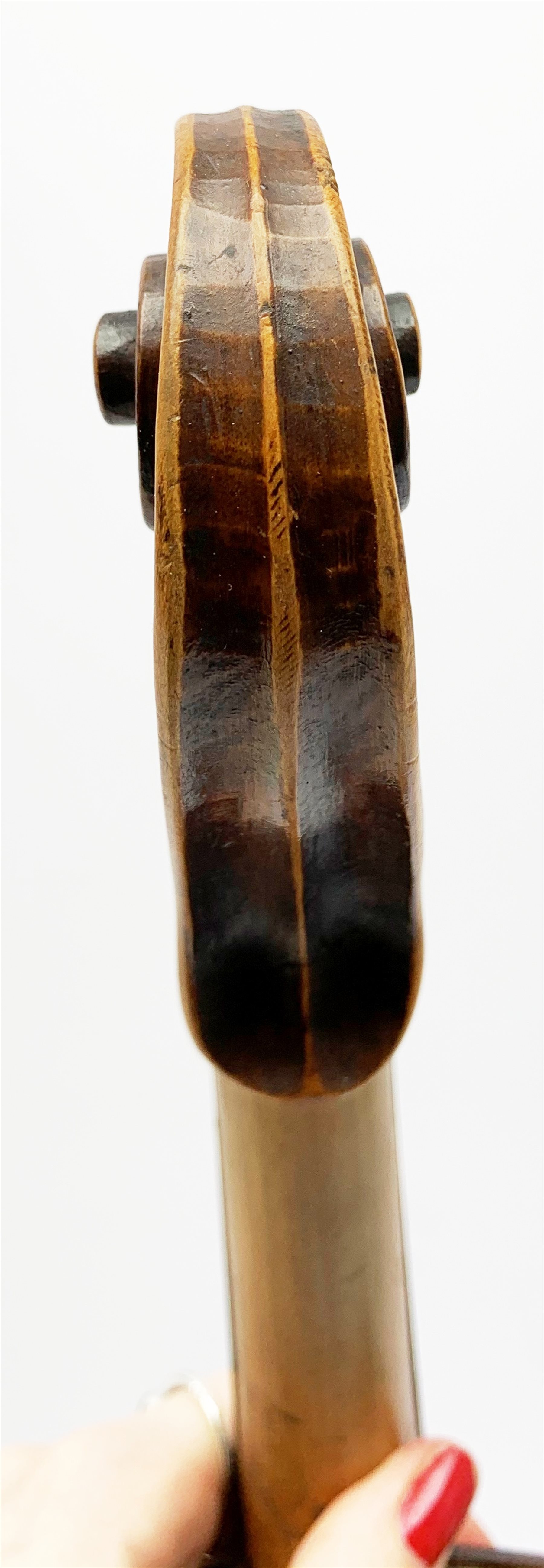  Late 19th century German violin for completion with 36cm one-piece maple back and ribs and spruce top, bears label Copie De Albani Palermo 1633, 59cm overall together with three books on violin construction, restoration and varnishing  