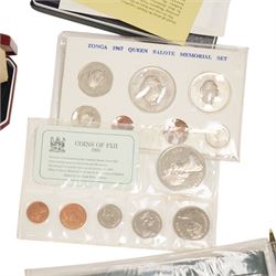 Twelve international proof coin sets, all produced by The Franklin Mint and containing high denomination silver coins, comprising two Republic of the Philippines 1975 proof eight coin sets, two Commonwealth of the Bahamas proof nine coin sets, 1973 and 1976, Guyana 1976 proof eight coin set, Jamaica 1976 proof nine coin set, Papua New Guinea 1976 proof eight coin set, First National Coinage of Barbados 1973 proof eight coin set, Ethiopia 1977 proof five coin set, Republic of Seychelles 1976 proof eight coin set, British Virgin Islands 1977 Royal Silver Jubilee proof six coin set, First Official Coinage of the British Virgin Islands 1973 proof six coin set; together with Pobjoy Mint Isle of Man 1977 silver proof seven coin set, 'Commemoration of the 1100th Anniversary of the Settlement of Iceland' 1974 proof two coin set, The Royal Mint United Kingdom 1977 Silver Jubilee silver proof crown coin, and other international proof sets